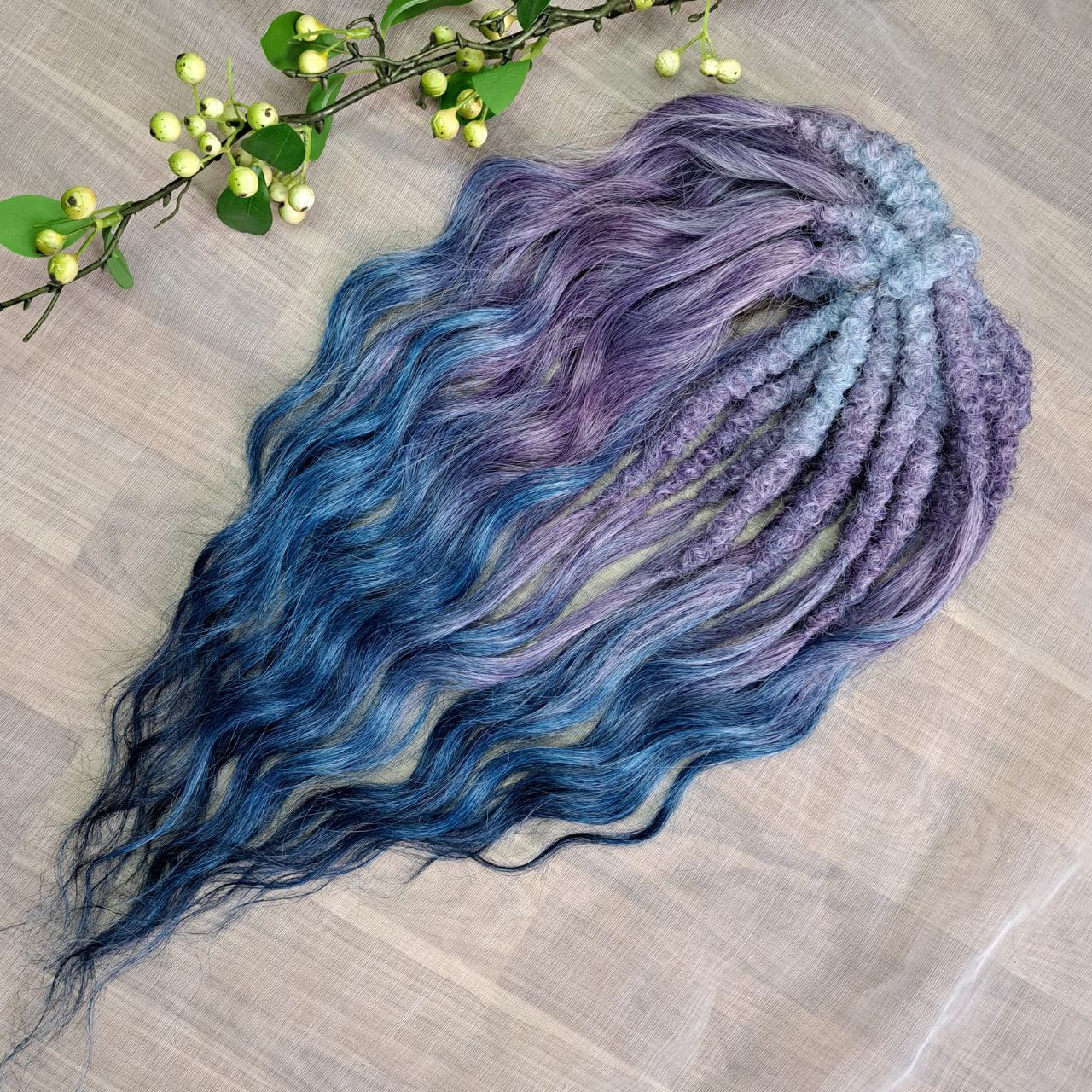 This set features a smooth lavender-to-indigo gradient with cool, clean tones and a soft transition between shades. Soft, lightweight, and reusable double ended synthetic brushable curls.