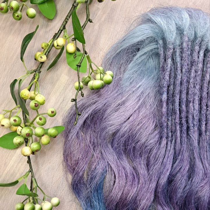 This set features a smooth lavender-to-indigo gradient with cool, clean tones and a soft transition between shades. Soft, lightweight, and reusable double ended synthetic brushable curls.
