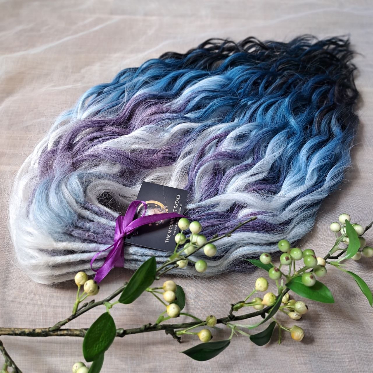 This set blends soft lilac, icy blonde, cool blue, and deep navy into a clean, cold-toned gradient. Lightweight, brushable, and reusable synthetic double-ended wavy dreadlocks with a smooth transition between shades.
Perfect for those who prefer crisp, cool colors and a fresh winter-inspired look.