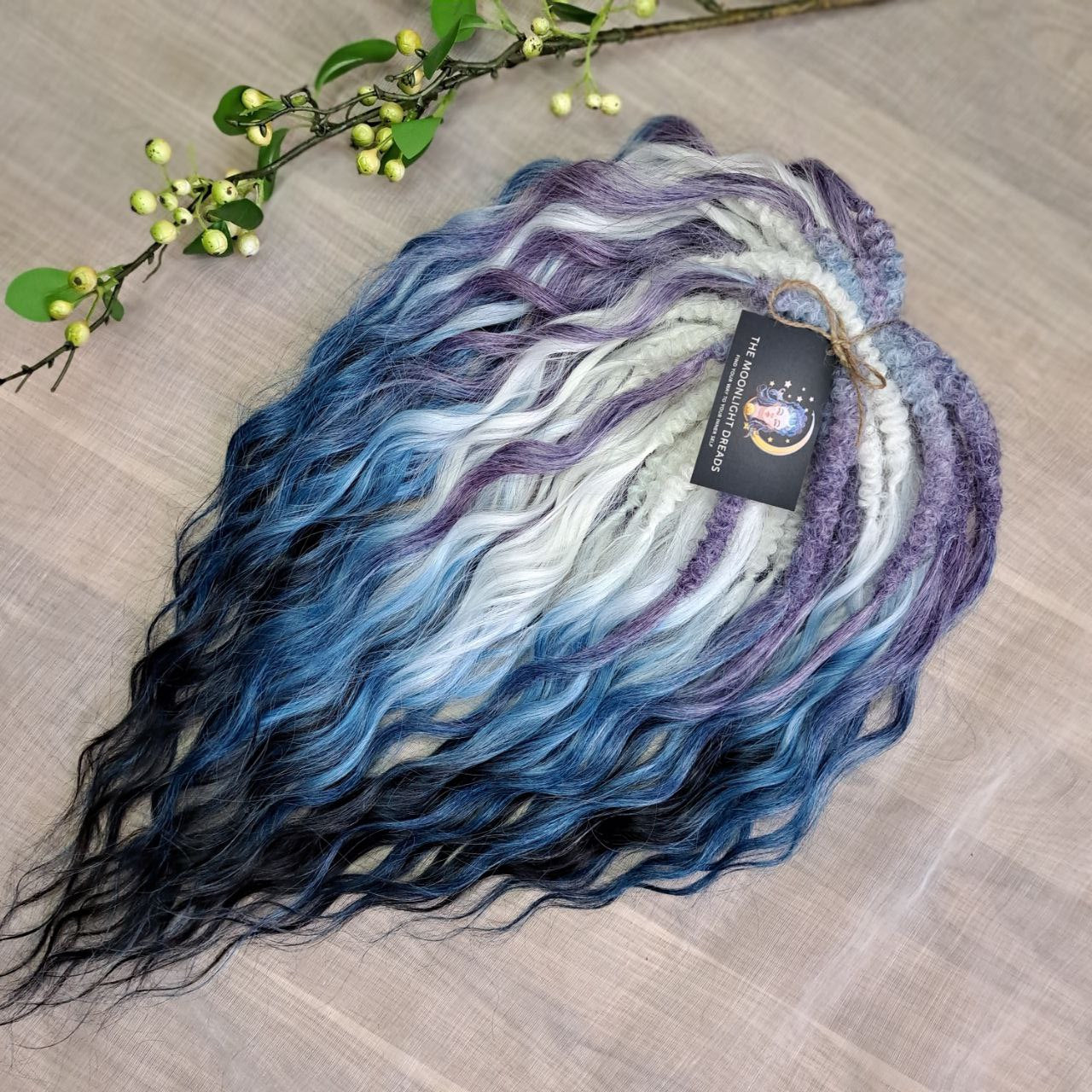 This set combines soft lilac, icy blonde, cool blue, and deep navy into a clean, cold-toned gradient. Lightweight, brushable, and reusable synthetic double-ended wavy dreadlocks with a smooth transition between shades.
Perfect for those who prefer crisp, cool colors and a fresh winter-inspired look.

📏 The length:
Standard dreaded: 22–24 inches (55–60 cm), dreaded part ±3–4 inches
Braided middle: 22–24 inches (55–60 cm), braid ±4–5 inches folded (total ±8–10 inches)
Push-up / Dolly: 20–22 inches (50–55 cm)