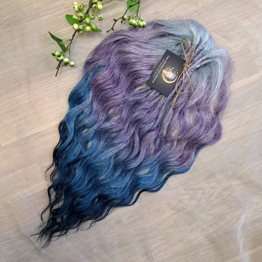 This set features a smooth lavender-to-indigo gradient with cool, clean tones and a soft transition between shades. Soft, lightweight, and reusable double ended synthetic brushable curls.
