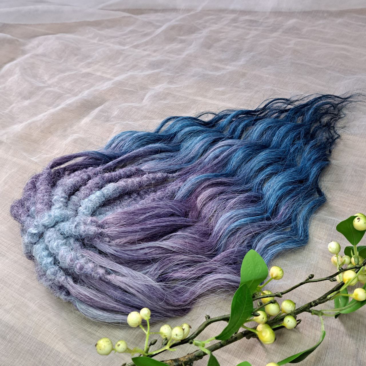 This set features a smooth lavender-to-indigo gradient with cool, clean tones and a soft transition between shades. Soft, lightweight, and reusable double ended synthetic brushable curls.