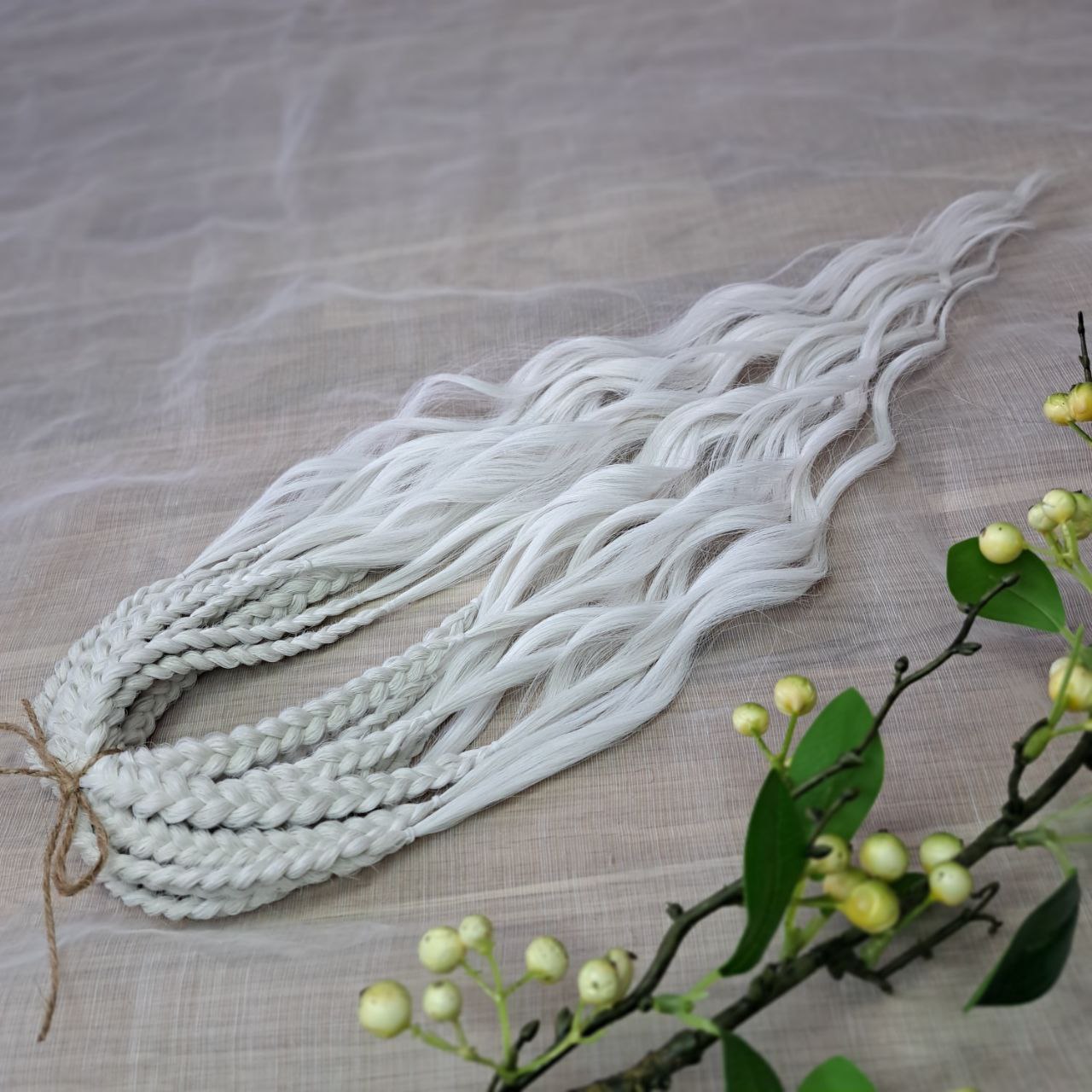 Snow-white soft, lightweight, and reusable synthetic brushable double ended wavy dreadlocks (regular dreaded, braided middle, or push-up).