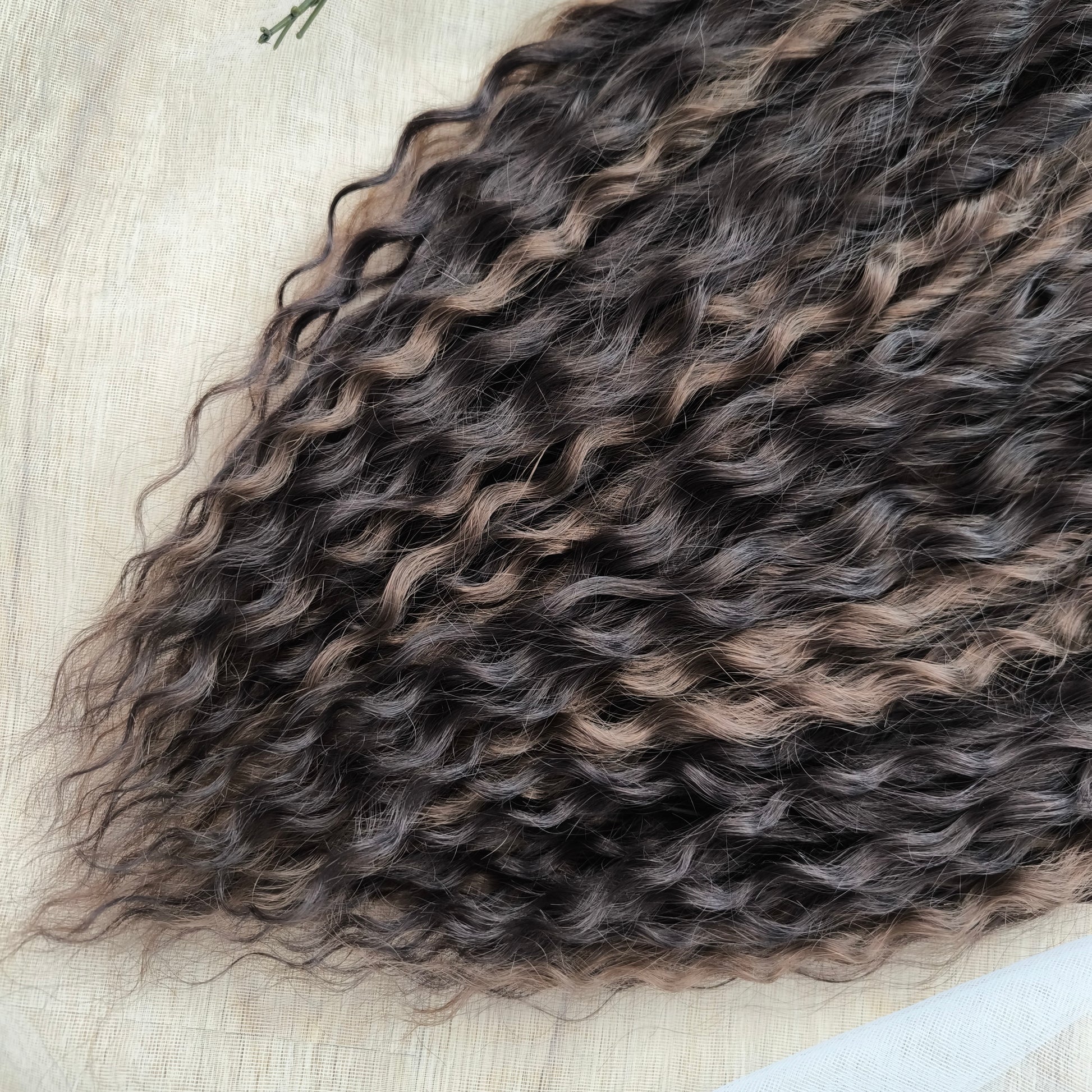 Soft, lightweight, and reusable synthetic sets of regular double ended curls (NOT BRUSHABLE) in brown shades:

1. dark chocolate brown;
2. middle brown
3. light brown